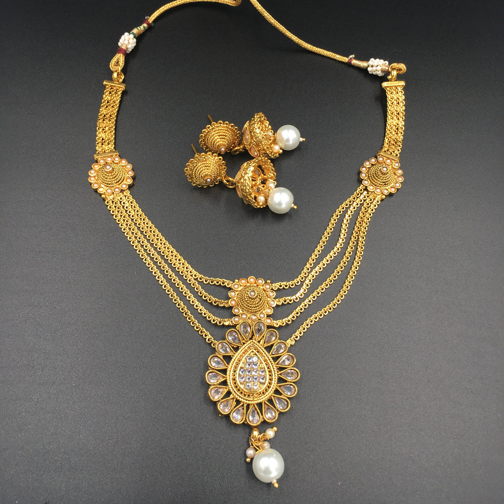 Four golden string necklace with Moti and Jhumki earrings