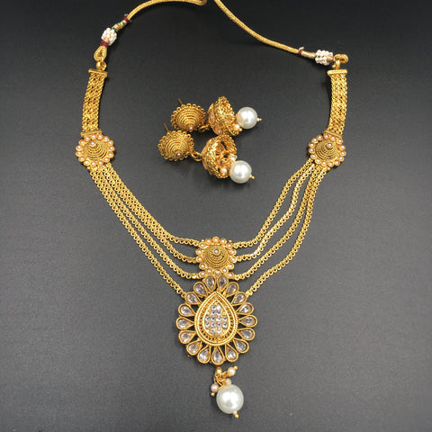Four golden string necklace with Moti and Jhumki earrings