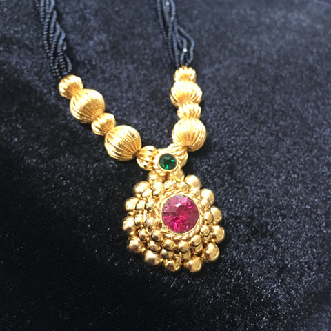 KOPM - Round pendant with green and Pink Stone and golden beads